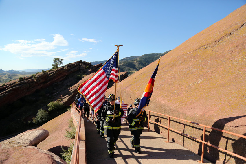 Members of West Metro Fire lead the 9/11 Stiar Climb at Red Rocks.